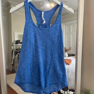 Lululemon Blue Top with Slit In Back. Size 4.